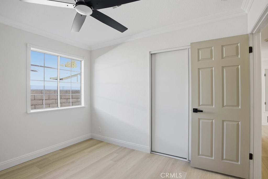 7051 Idyllwild Lane Riverside, CA 92503 - Photo 21 of 40 an empty room with windows