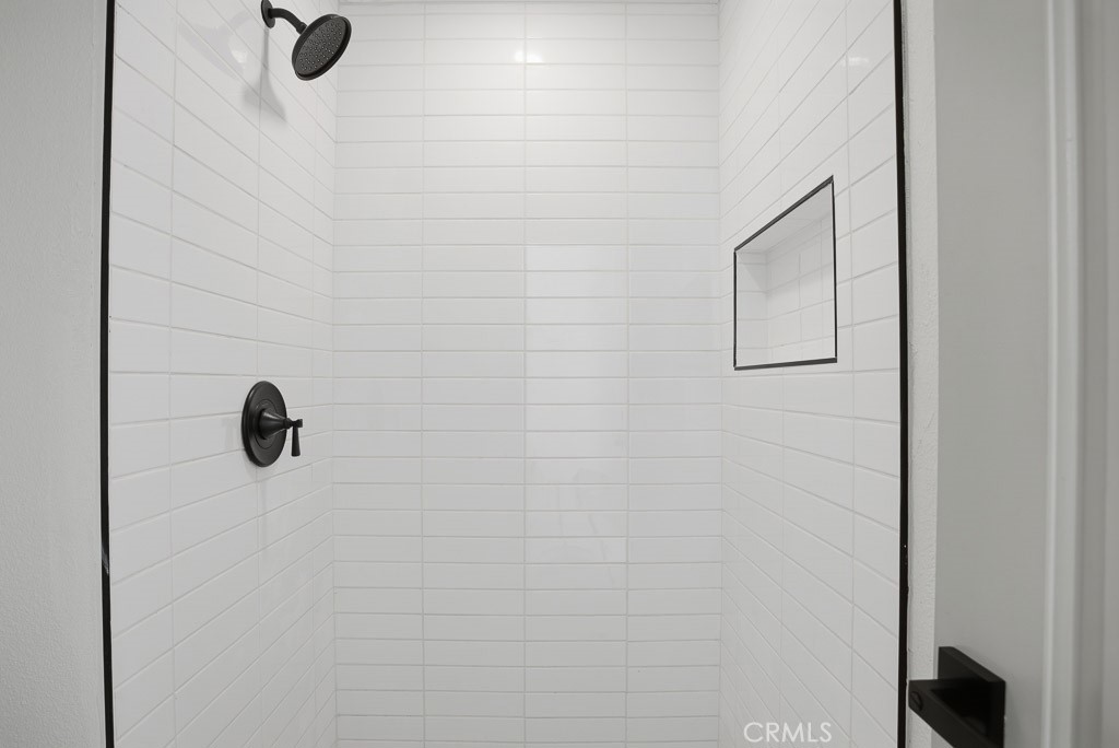 7051 Idyllwild Lane Riverside, CA 92503 - Photo 28 of 40 a bathroom with a shower