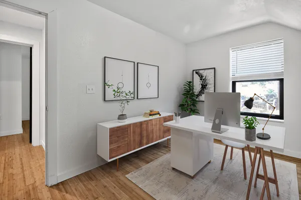 a kitchen with stainless steel appliances granite countertop a sink refrigerator and microwave