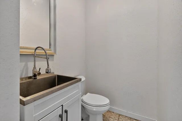 a bathroom with a bathtub and a toilet