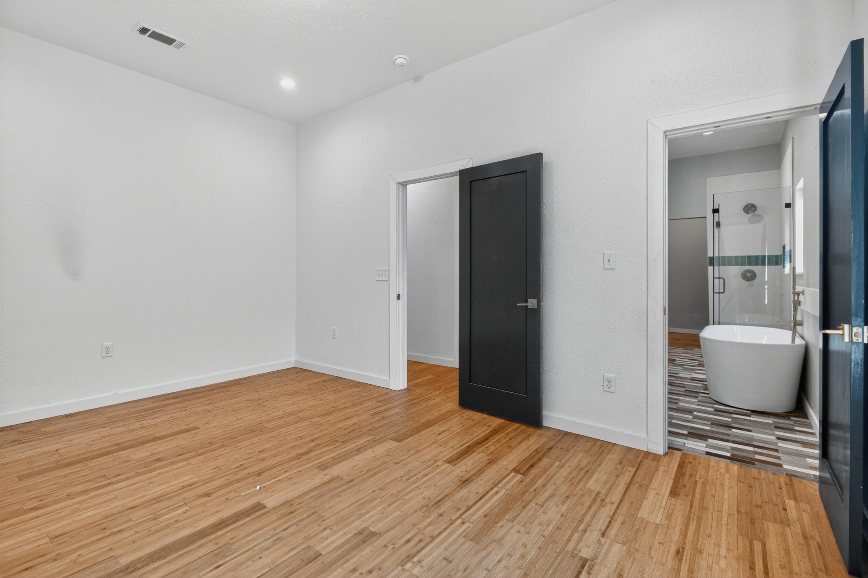 115 Ridgewood Avenue Mary Esther, FL 32569 - Photo 30 of 54 a view of an empty room and wooden floor
