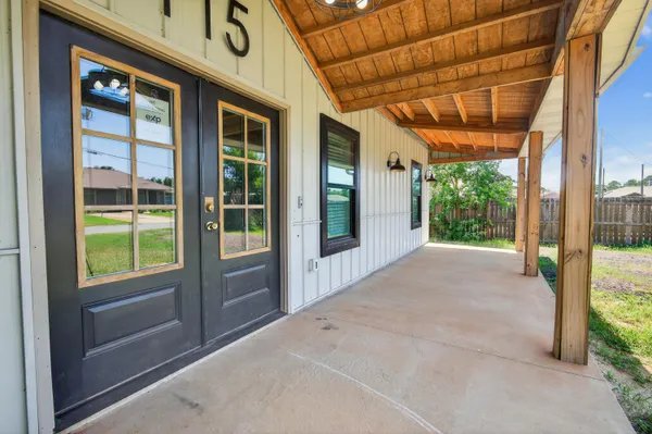a house view with a garden space