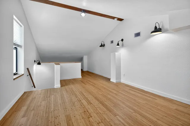 a view of a livingroom with a furniture