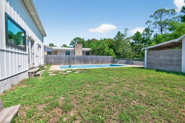 a house view with a garden space