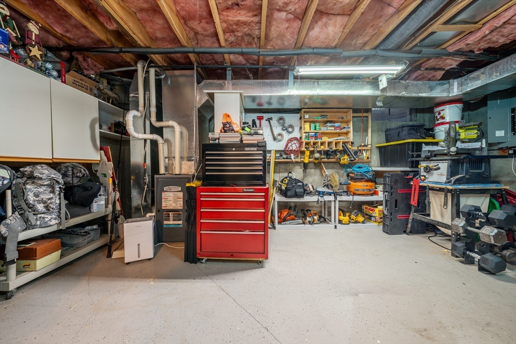 195 Falmouth Road, Unit 9D Mashpee, MA 02649 - Photo 24 of 29 a view of storage and utility room