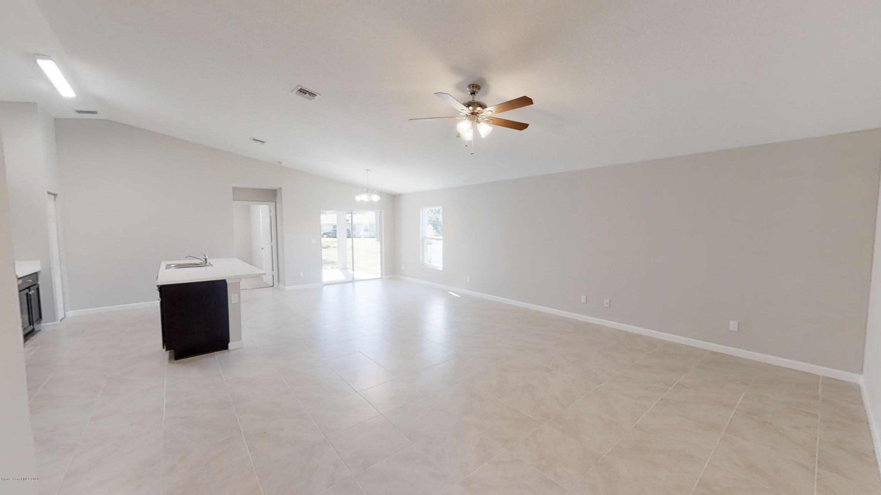 1000 Cranberry Road Southeast Palm Bay, FL 32909 - Photo 2 of 15 Hudson-4-Left-Side-Garage-01072020_09283