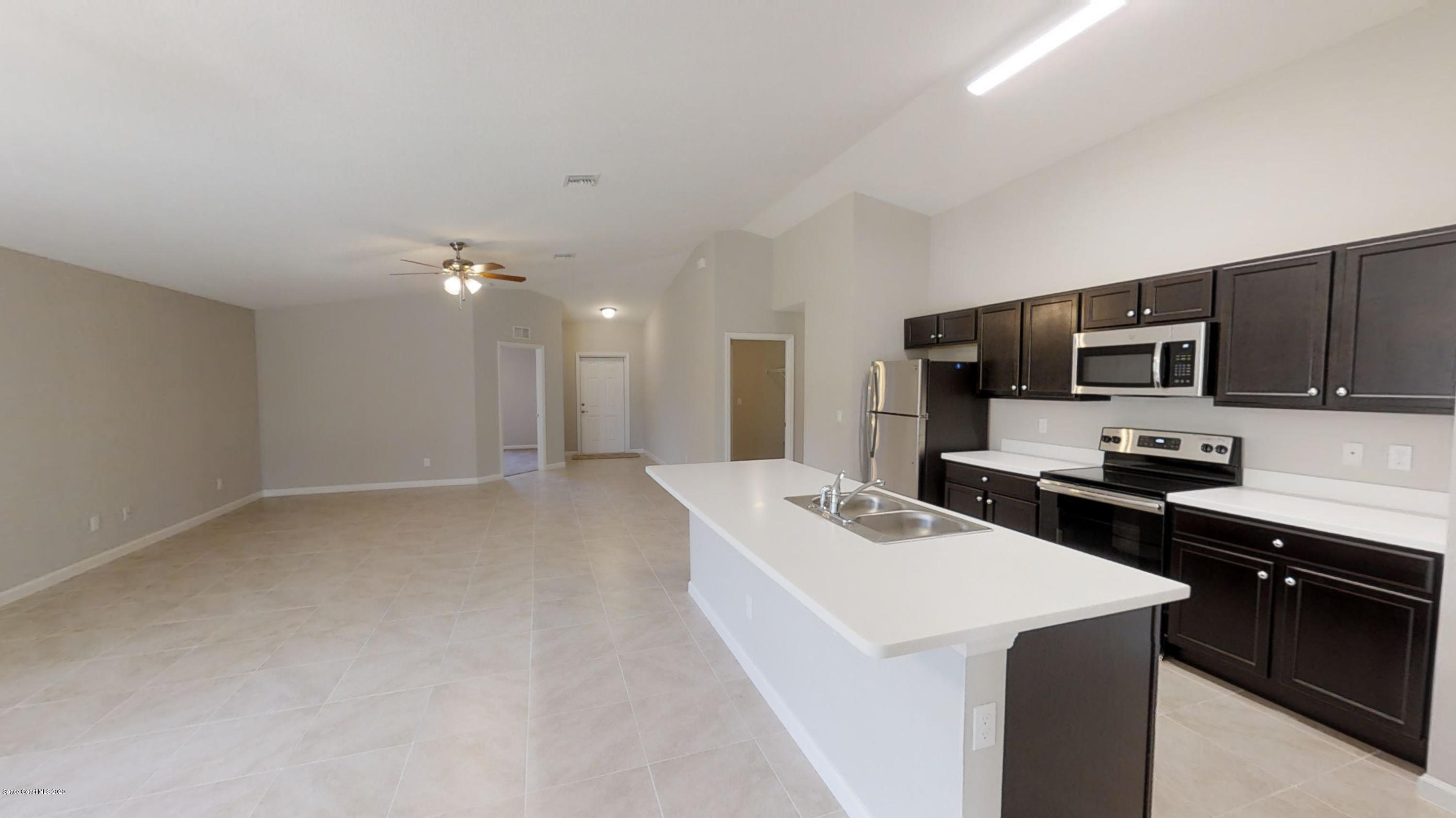 1000 Cranberry Road Southeast Palm Bay, FL 32909 - Photo 11 of 15 Hudson-4-Left-Side-Garage-01072020_09323
