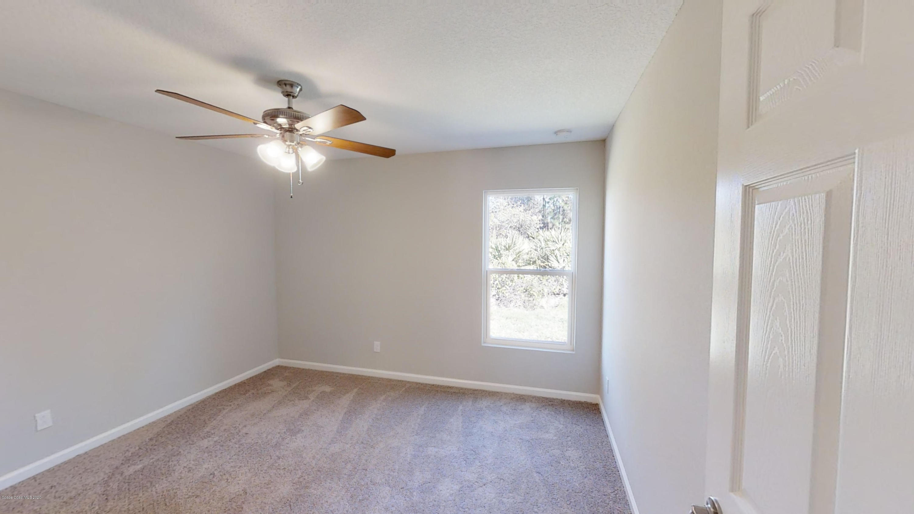 1000 Cranberry Road Southeast Palm Bay, FL 32909 - Photo 12 of 15 Hudson-4-Left-Side-Garage-01072020_09330