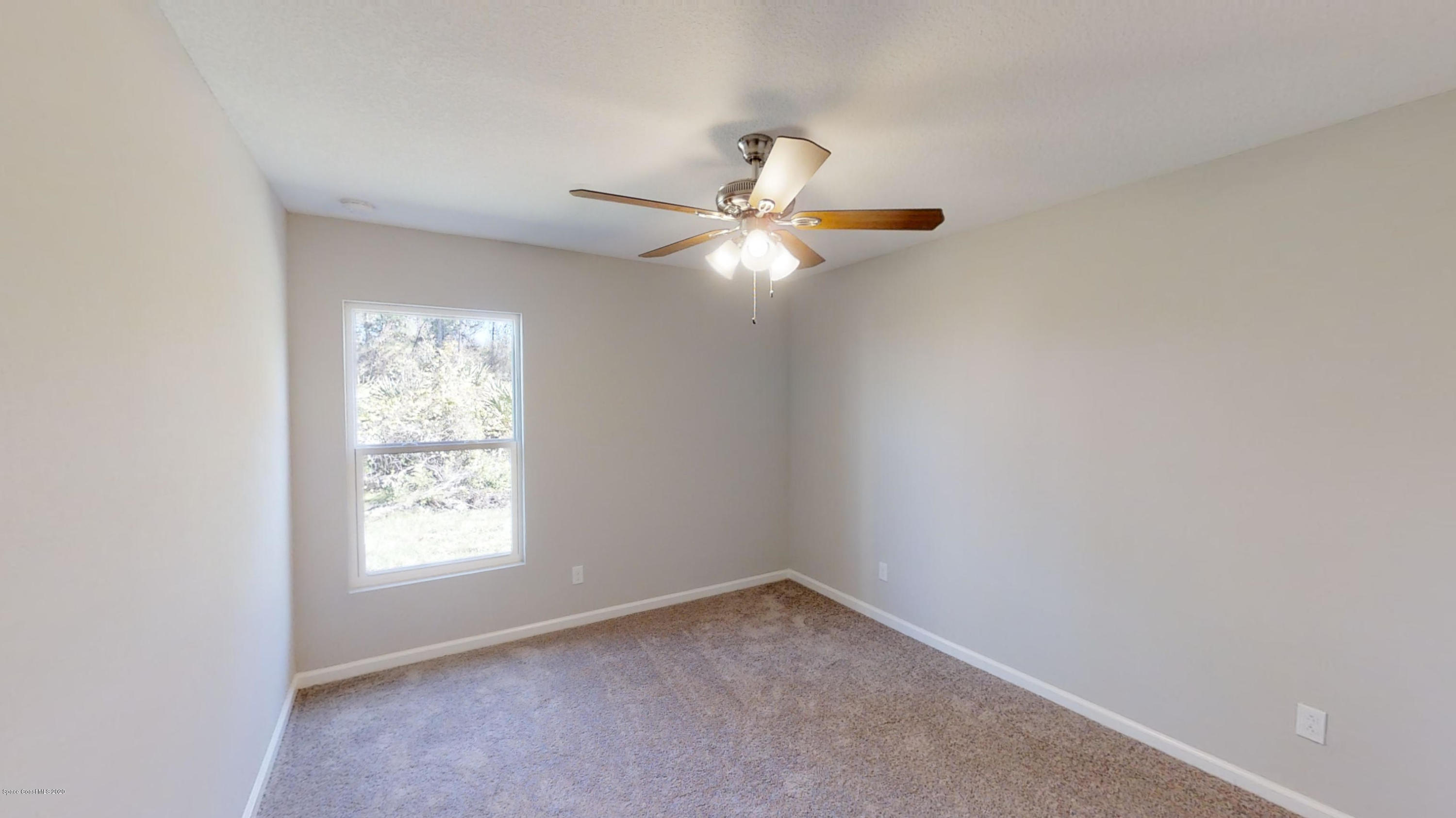 1000 Cranberry Road Southeast Palm Bay, FL 32909 - Photo 14 of 15 Hudson-4-Left-Side-Garage-01072020_09341