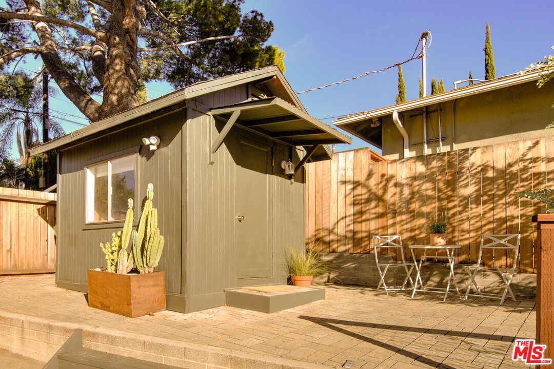 10816 Redmont Avenue Tujunga, CA 91042 - Photo 30 of 31 a street view along with residential house