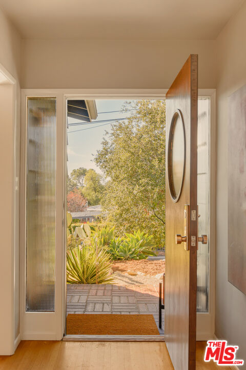 10816 Redmont Avenue Tujunga, CA 91042 - Photo 4 of 31 a bathroom with a shower and a mirror