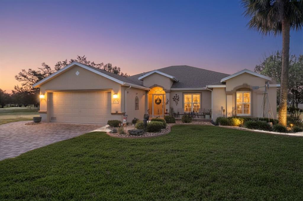 15525 Southwest 14th Avenue Road Ocala, FL 34473 - Photo 1 of 75 a front view of a house with a yard