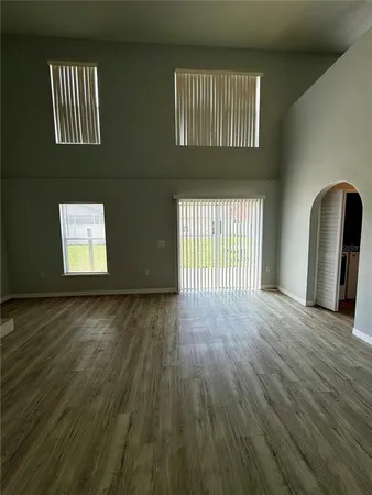 an empty room with windows