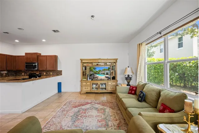 a living room with furniture and a window