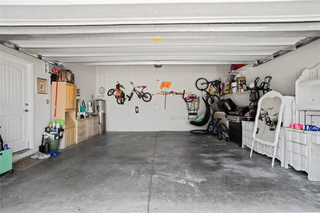 a white toilet sitting next to a shower