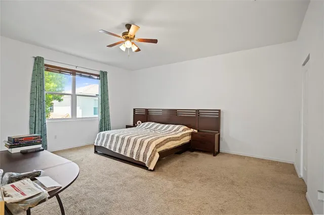 a bathroom with a shower and toilet