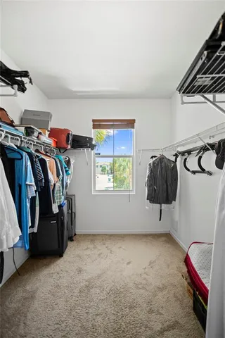 a bathroom with a granite countertop sink a mirror and a