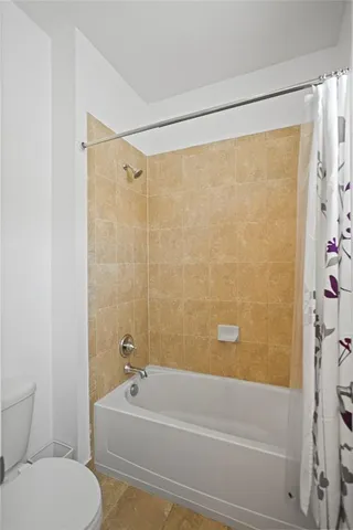 a view of a house with swimming pool and sitting area