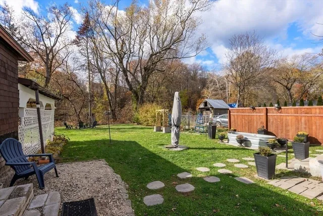 a view of outdoor space with deck and garden