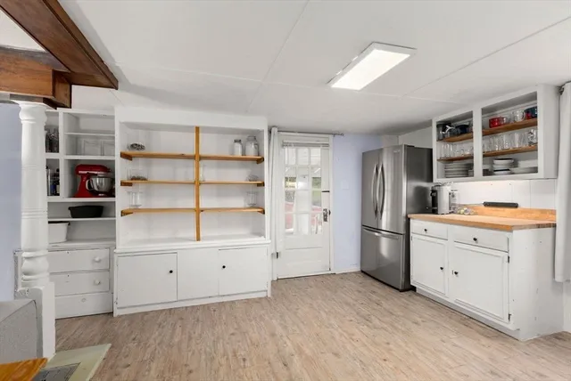 a room with storage and cabinets