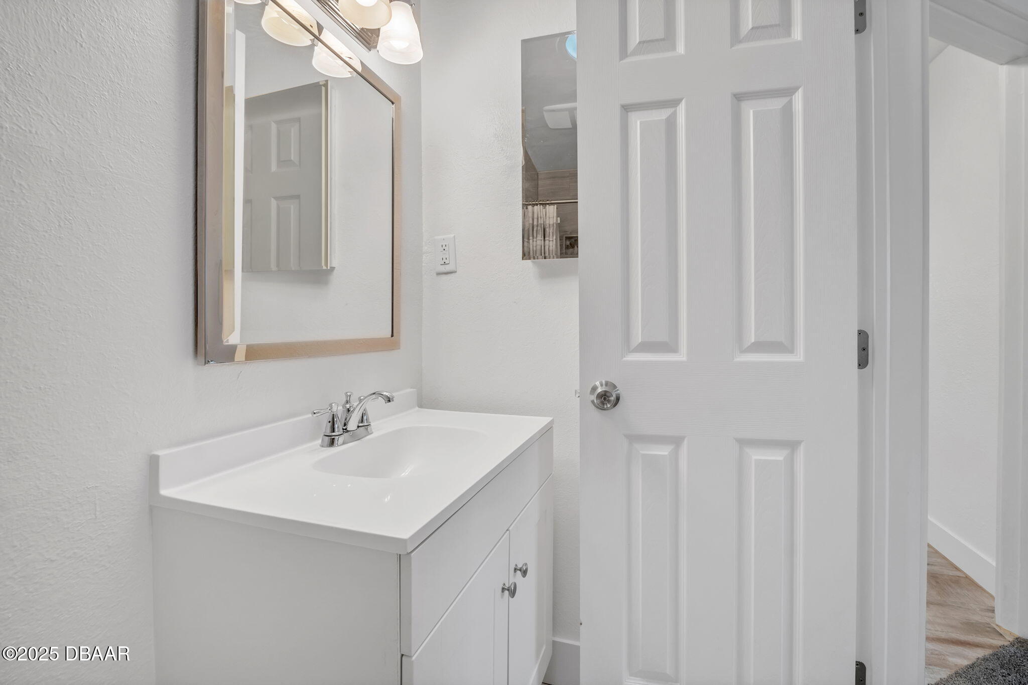 450 Lambert Avenue Flagler Beach, FL 32136 - Photo 27 of 47 a bathroom with a sink and a mirror