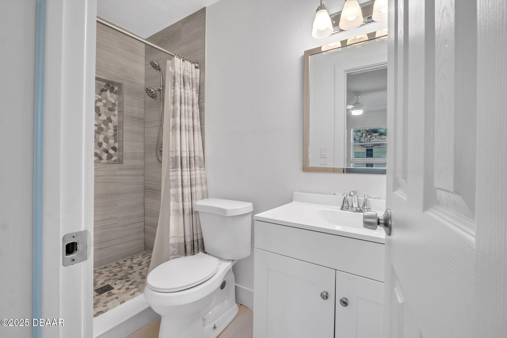 450 Lambert Avenue Flagler Beach, FL 32136 - Photo 28 of 47 a bathroom with a sink toilet and shower