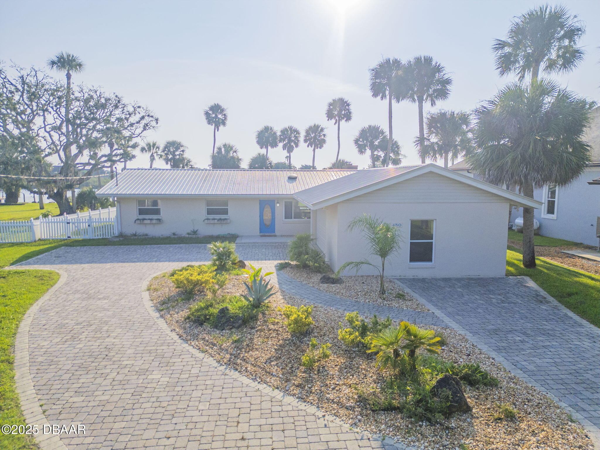 450 Lambert Avenue Flagler Beach, FL 32136 - Photo 3 of 47 a view of a house with backyard and sitting area