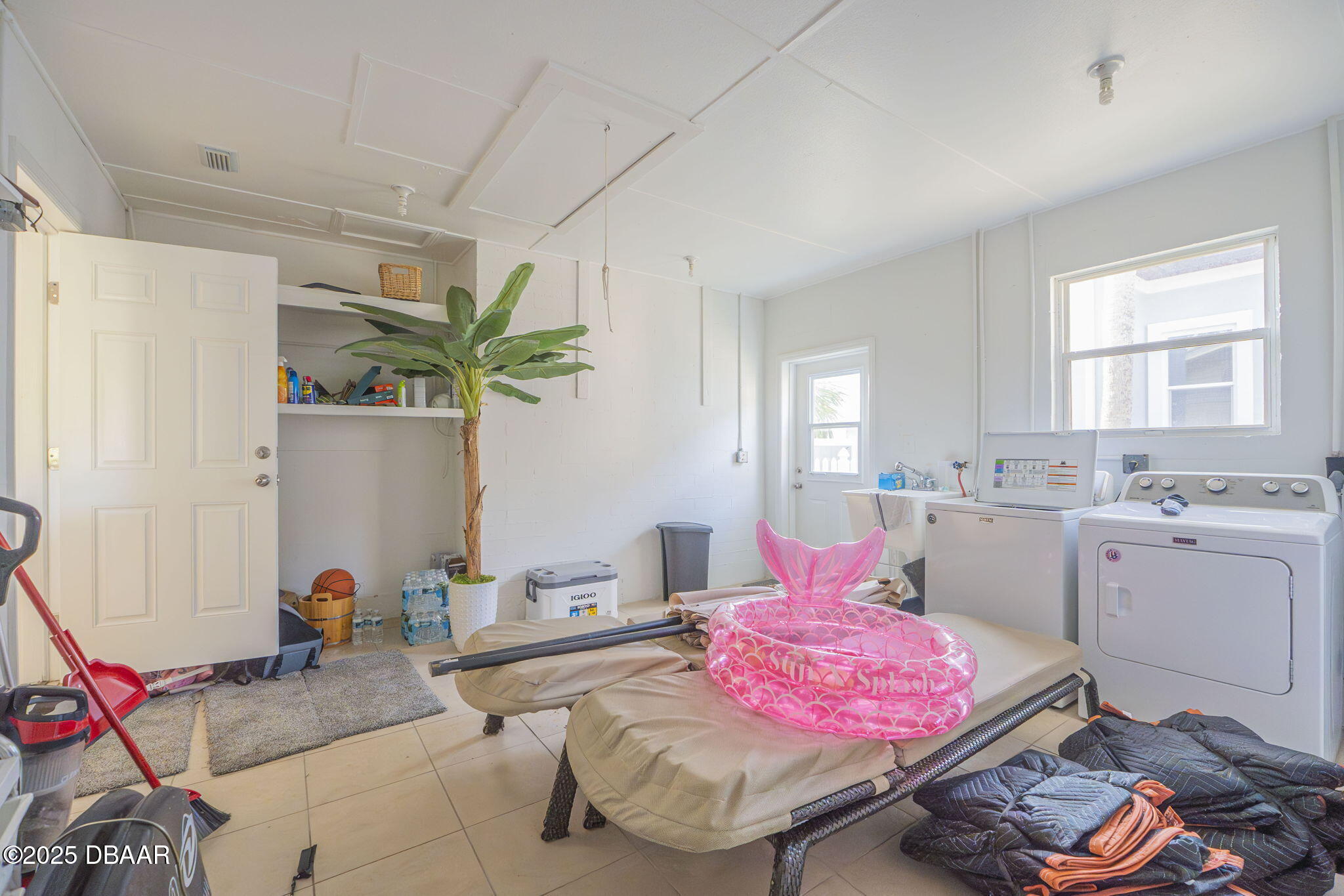 450 Lambert Avenue Flagler Beach, FL 32136 - Photo 47 of 47 a bedroom with furniture and a window