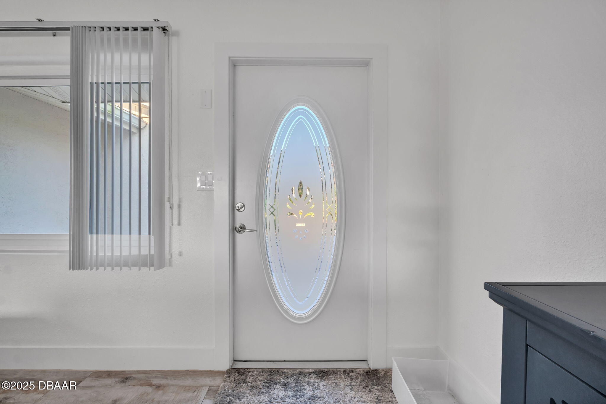 450 Lambert Avenue Flagler Beach, FL 32136 - Photo 6 of 47 a front view of a house with entryway