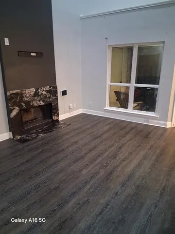 a stove top oven sitting inside of a kitchen