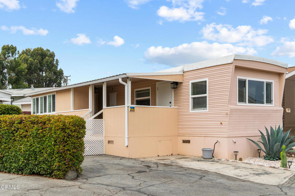 7368 Hollister Avenue, Unit 28 Goleta, CA 93117 - Photo 2 of 33 a view of a house with a yard