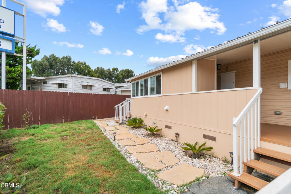 7368 Hollister Avenue, Unit 28 Goleta, CA 93117 - Photo 3 of 33 a backyard of a house with an outdoor space