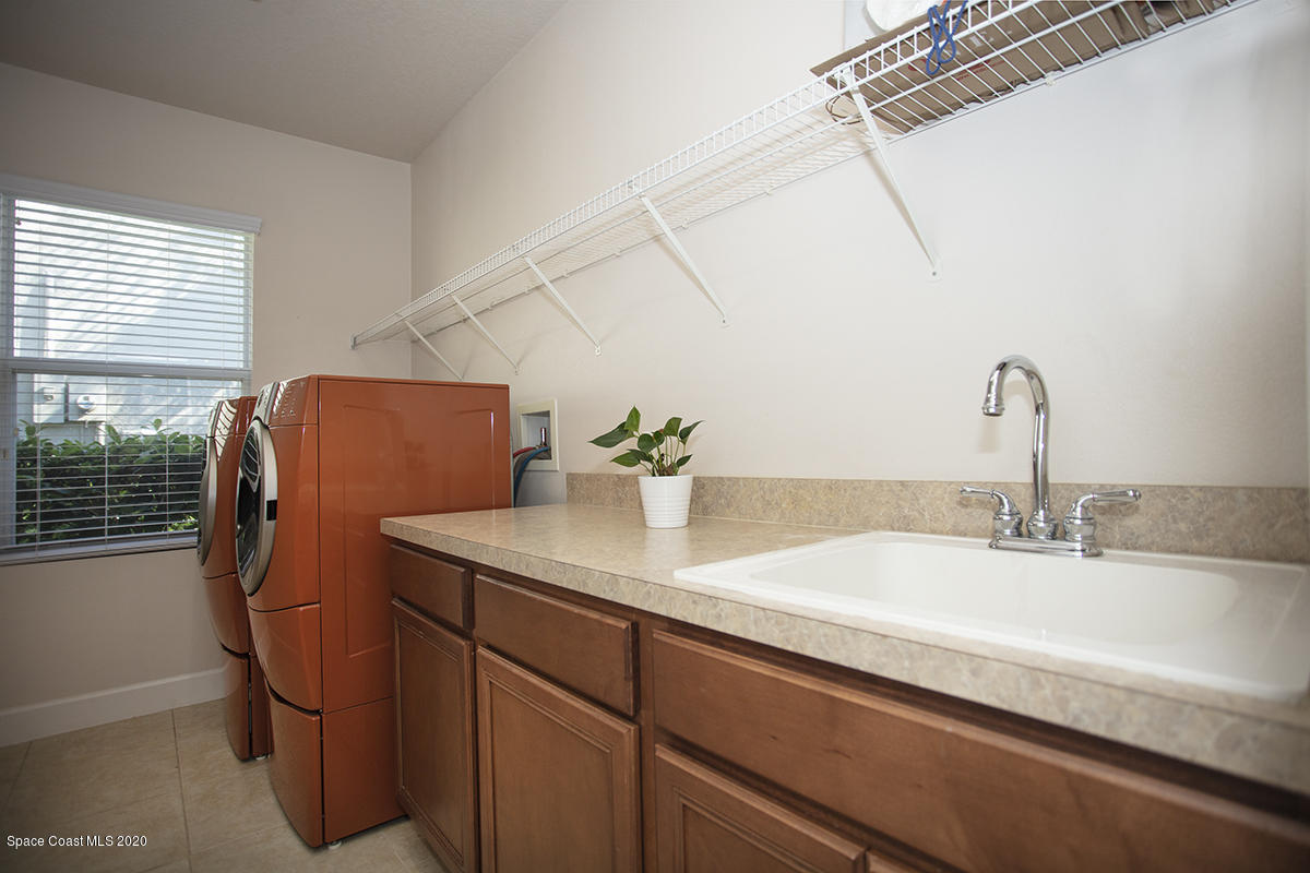 1694 Simerick Lane Melbourne, FL 32940 - Photo 38 of 55 Laundry Room