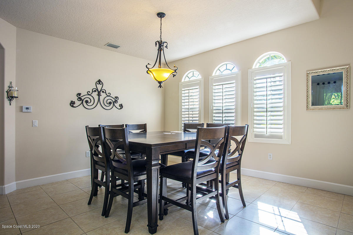 1694 Simerick Lane Melbourne, FL 32940 - Photo 8 of 55 Formal Dining