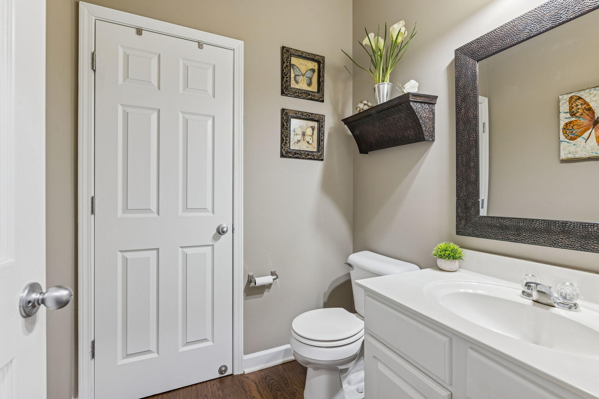 4028 Williford Way Spring Hill, TN 37174 - Photo 19 of 70 a bathroom with a toilet sink and mirror