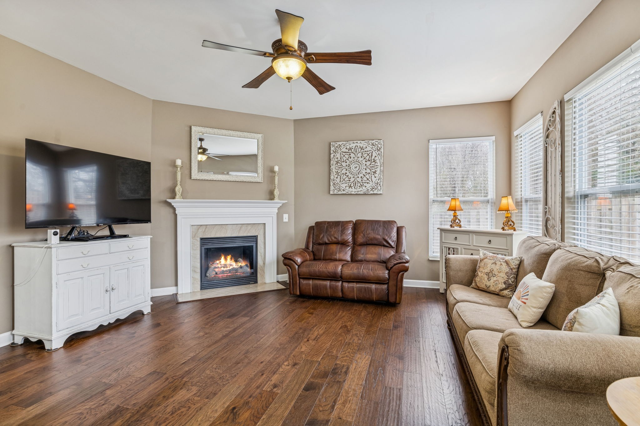 4028 Williford Way Spring Hill, TN 37174 - Photo 23 of 70 a living room with furniture fireplace and flat screen tv