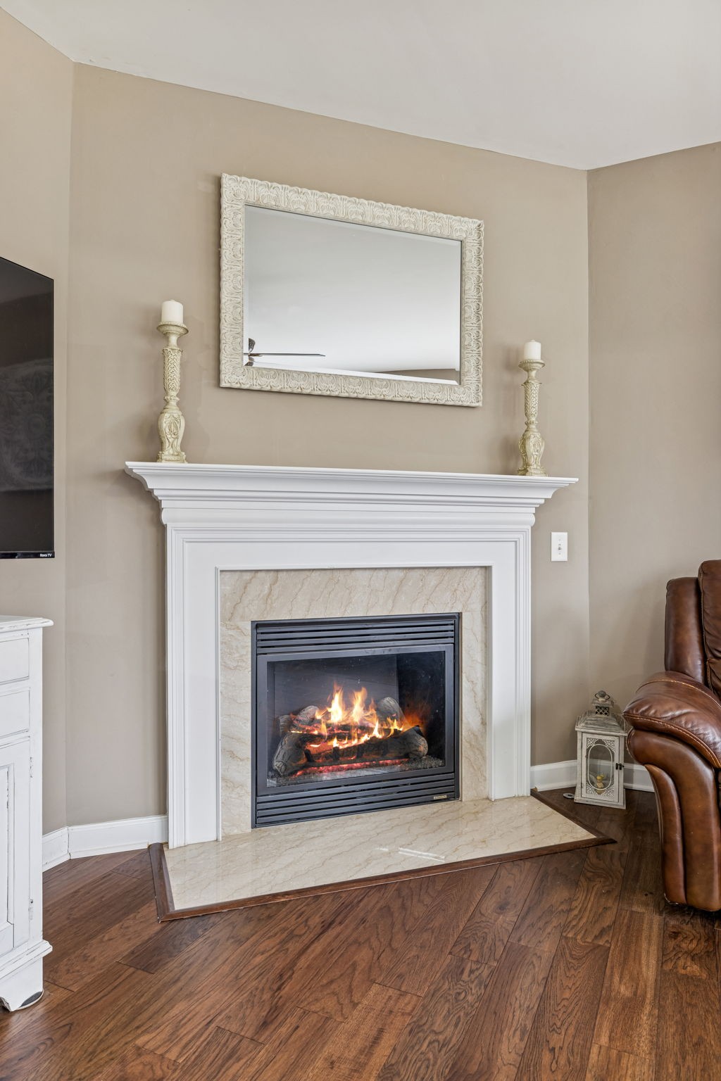 4028 Williford Way Spring Hill, TN 37174 - Photo 25 of 70 a living room with furniture and a fireplace
