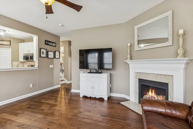 a kitchen with stainless steel appliances a stove a sink and a microwave