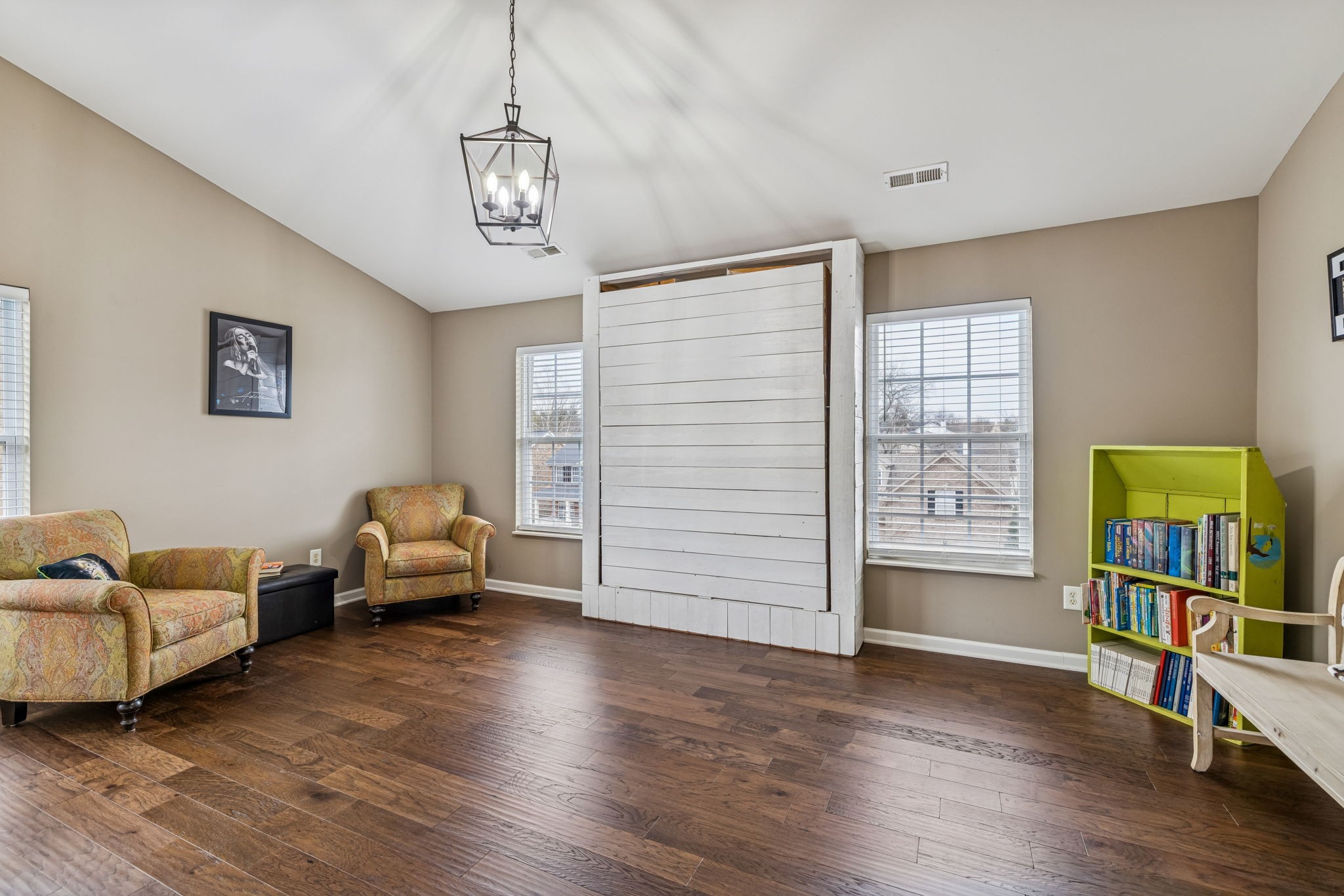 4028 Williford Way Spring Hill, TN 37174 - Photo 40 of 70 a bedroom with furniture and a wooden floor