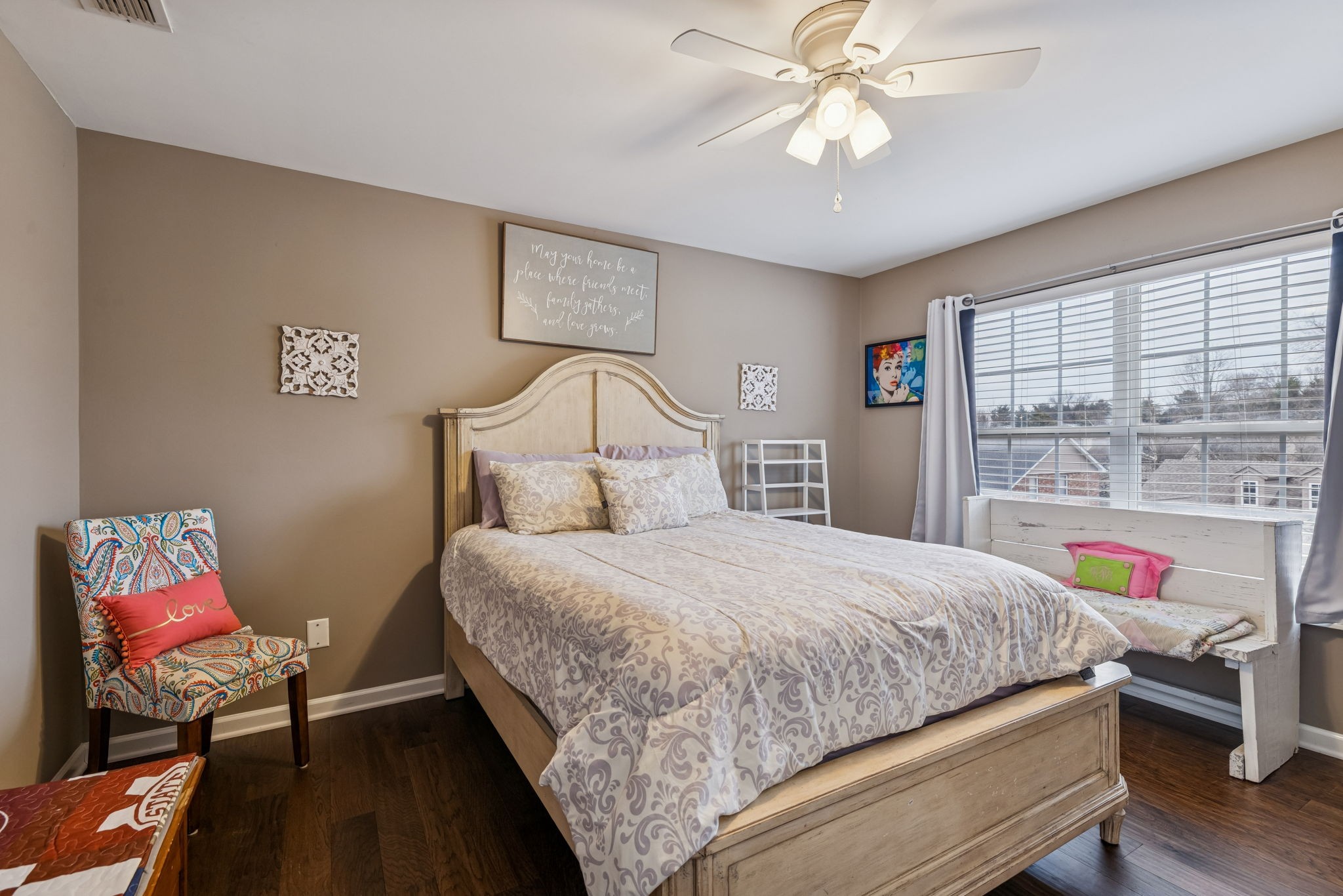 4028 Williford Way Spring Hill, TN 37174 - Photo 57 of 70 a bedroom with a bed and a chandelier