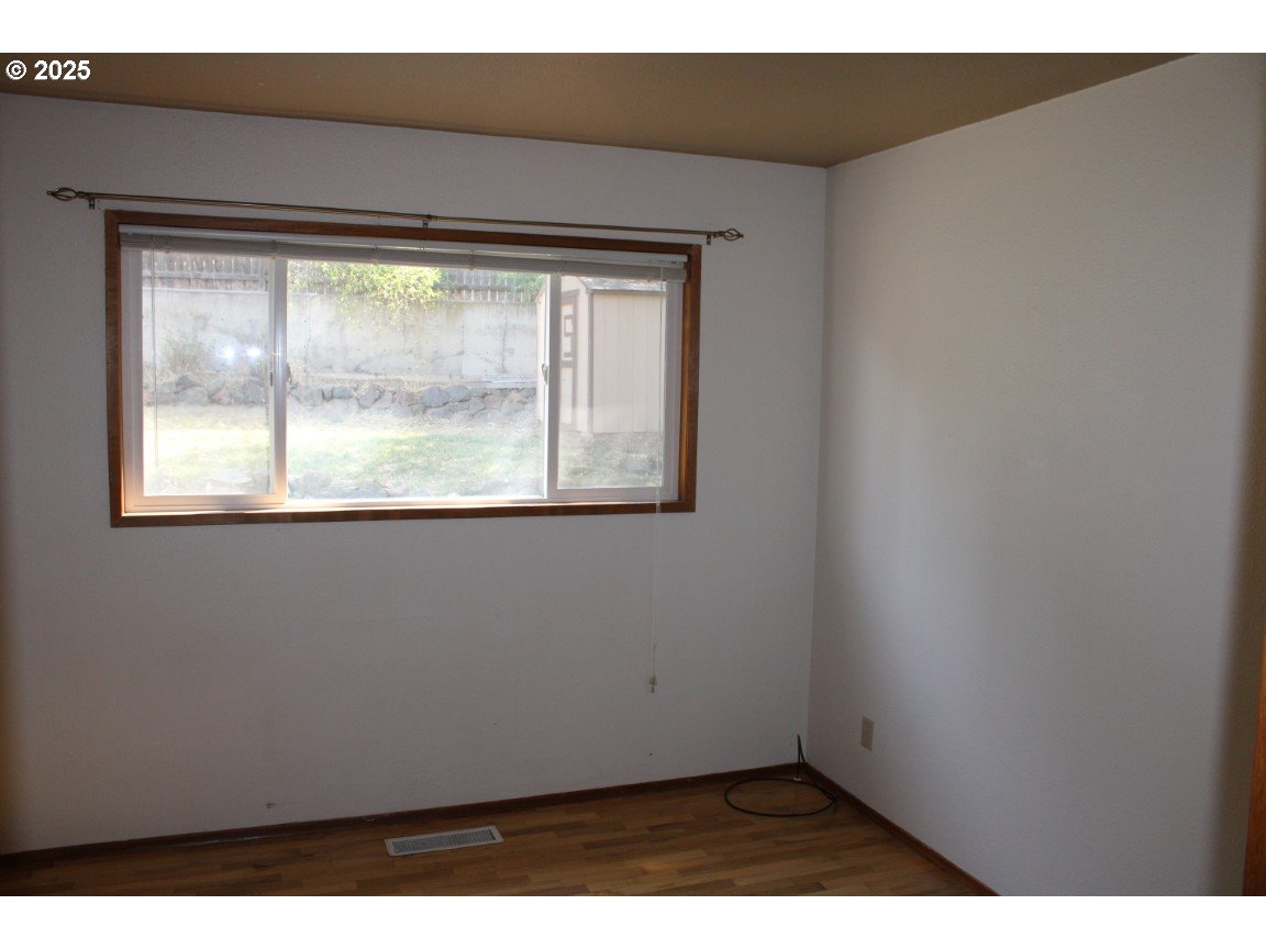 1206 Southwest 24th Street Pendleton, OR 97801 - Photo 12 of 21 a view of an empty room with a window
