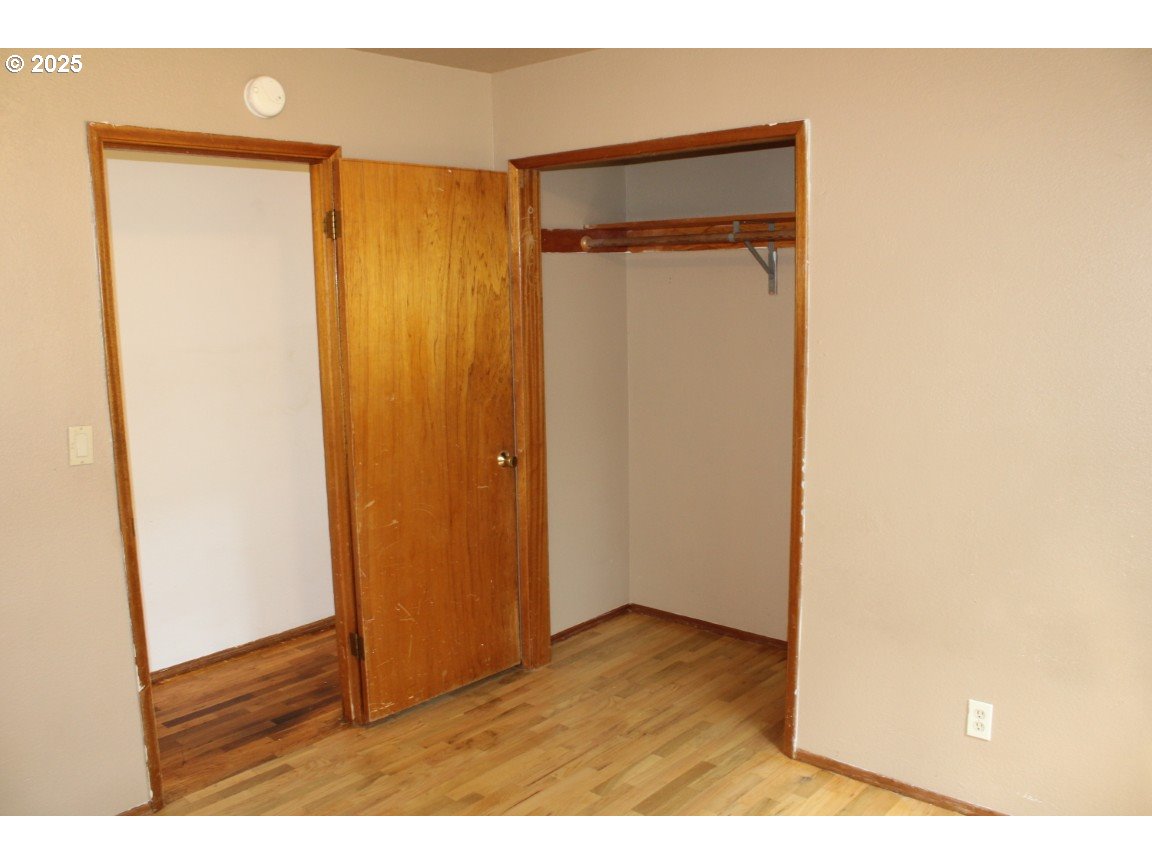 1206 Southwest 24th Street Pendleton, OR 97801 - Photo 13 of 21 a view of an empty room with wooden floor