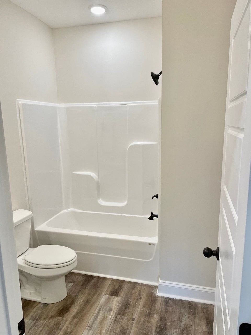 500 Peachers Mill Road, Unit C2 Clarksville, TN 37042 - Photo 14 of 16 a bathroom with a toilet and a shower