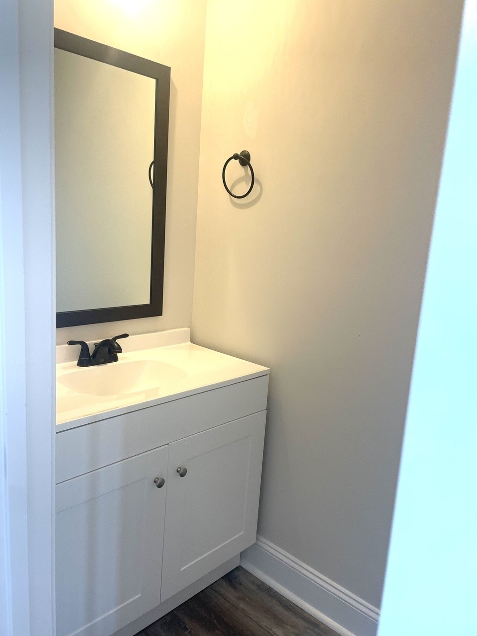500 Peachers Mill Road, Unit C2 Clarksville, TN 37042 - Photo 16 of 16 a bathroom with a granite countertop sink and mirror