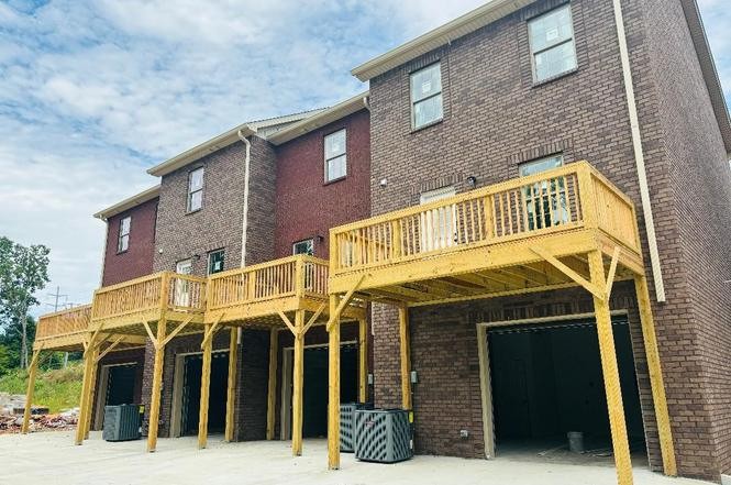 500 Peachers Mill Road, Unit C2 Clarksville, TN 37042 - Photo 2 of 16 a front view of a building with parking space