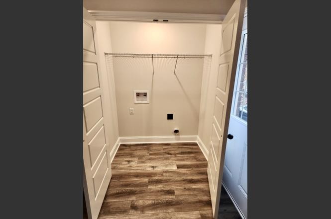500 Peachers Mill Road, Unit C2 Clarksville, TN 37042 - Photo 9 of 16 a view of a room with wooden floor and white walls