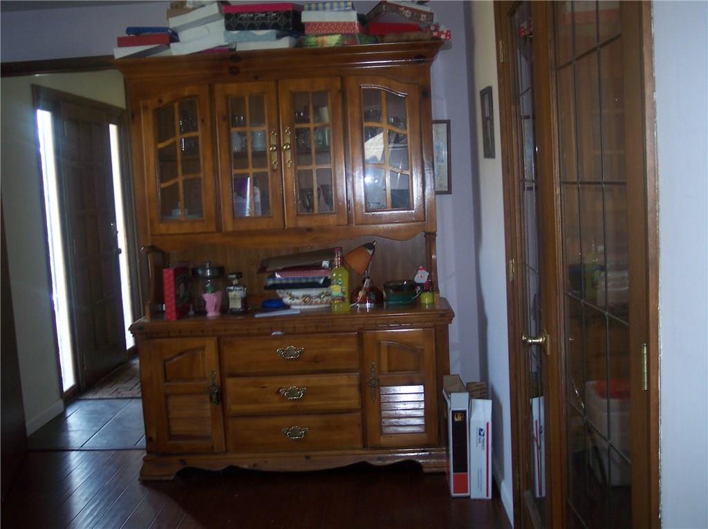 206 Ridgeview Drive Wexford, PA 15090 - Photo 7 of 12 Den with access to entry, with hardwood floors and French doors to Dining room