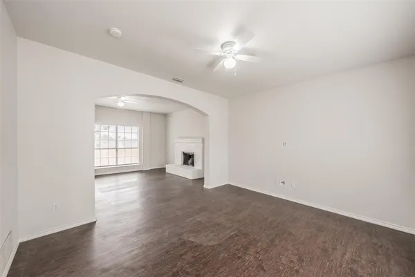 a view of hallway with windows