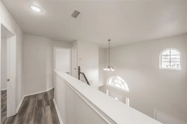 a view of hallway with stairs