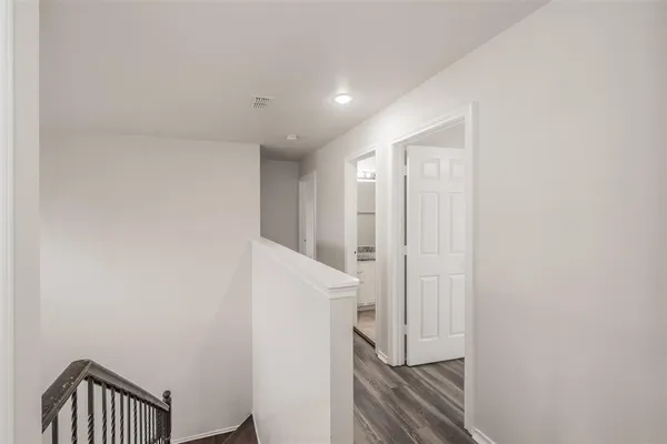 a view of a hallway with entryway